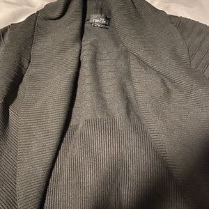 A black short sleeve sweater